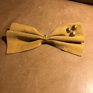 Gorgeous suede leather studded bow clip